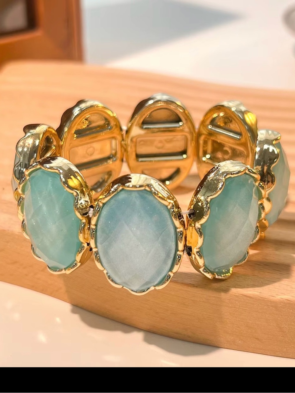 Gold Bracelet with Aqua Oval Stone Accents